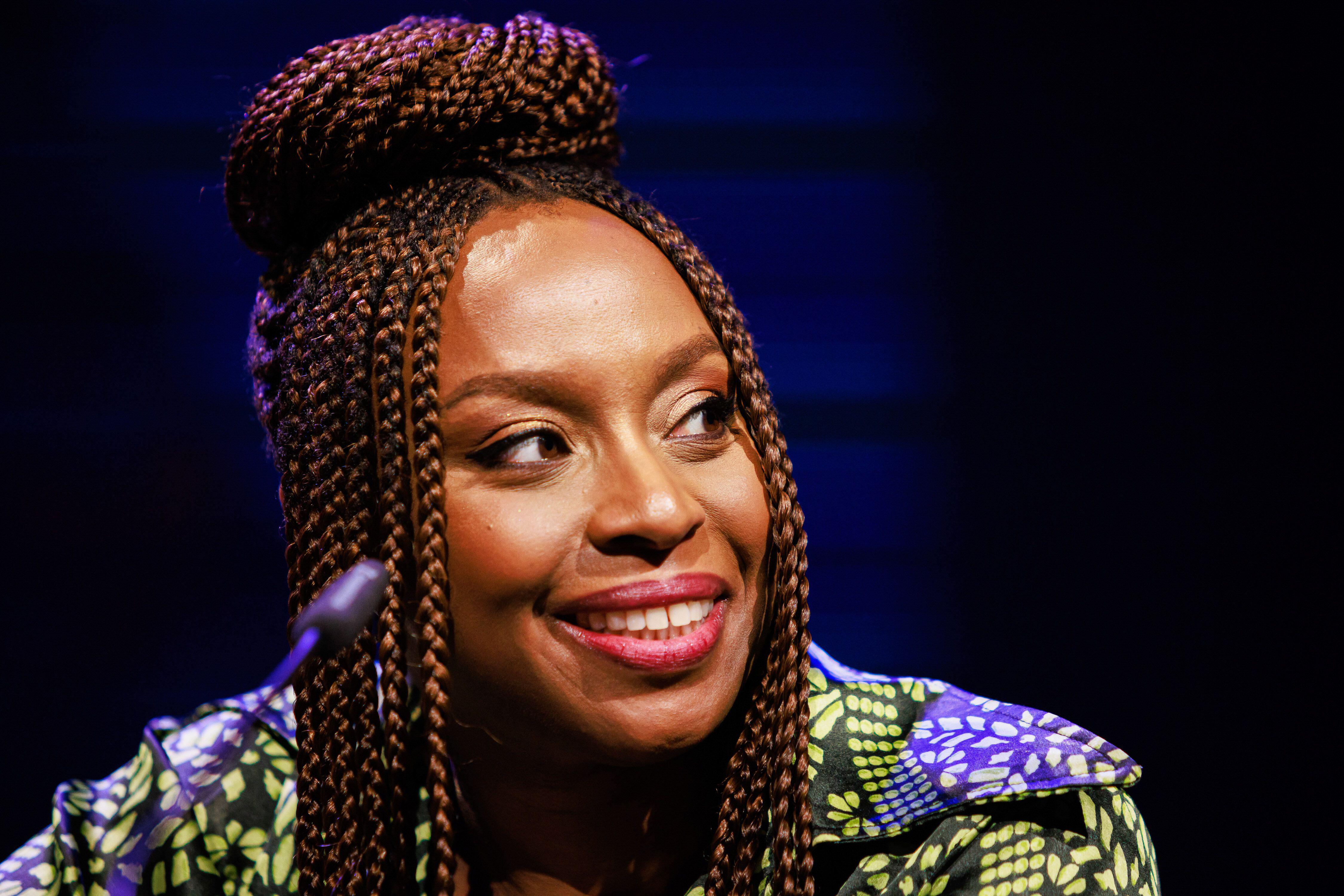 Chimamanda Ngozi Adichie speaking at a literary festival.